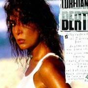 The lyrics UNA SERA CHE PIOVE of LOREDANA BERTÈ is also present in the album Fotografando (1986)