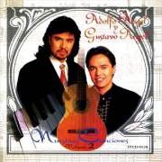 The lyrics LA MUJER DE LOS DOS of LOS TEMERARIOS is also present in the album Nuestras canciones vol. 2 (1997)