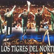 The lyrics LA FUGA DEL ROJO of LOS TIGRES DEL NORTE is also present in the album Tu noche con... (2008)