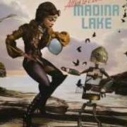 The lyrics NEVER WALK ALONE of MADINA LAKE is also present in the album Attics to eden (2009)