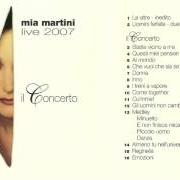 The lyrics PADRE DAVVERO of MIA MARTINI is also present in the album Una donna, una storia (1998)