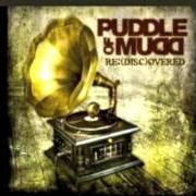 The lyrics ROCKET MAN of PUDDLE OF MUDD is also present in the album Re:(disc)overed (2011)
