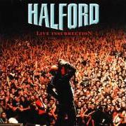 The lyrics RIDING ON THE WIND of ROB HALFORD is also present in the album Live insurrection (2001)