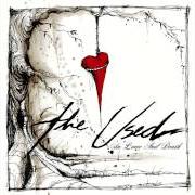 The lyrics I CAUGHT FIRE of THE USED is also present in the album In love and death (2004)