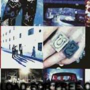 The lyrics TRYIN' TO THROW YOUR ARMS AROUND THE WORLD of U2 is also present in the album Achtung baby (1991)
