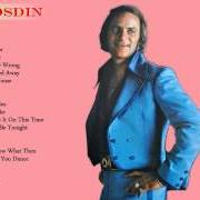 The lyrics TODAY MY WORLD SLIPPED AWAY of VERN GOSDIN is also present in the album Very best of the voice (2005)