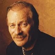 The lyrics IT'S NOT OVER, YET of VERN GOSDIN is also present in the album Chiseled in stone