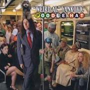 The lyrics WANNA B UR LOVR of "WEIRD AL" YANKOVIC is also present in the album Poodle hat (2003)