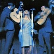 The lyrics THE TIMES THEY ARE A-CHANGIN' of PETER, PAUL & MARY is also present in the album In concert (1964)
