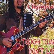 The lyrics GHETTO of GRADY CHAMPION is also present in the album Tough times don't last (2013)