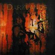 The lyrics SWANSONG of DARKLANDS is also present in the album Darklands (1998)