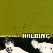 The lyrics JUST ANOTHER DAY of HOLDING ON is also present in the album Just another day (2001)