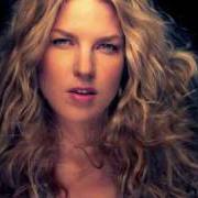 The lyrics ISN'T THIS A LOVELY DAY of DIANA KRALL is also present in the album From this moment on (2006)