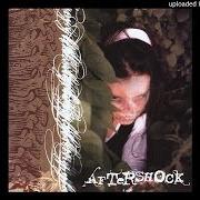 The lyrics IMPENETRABILITY of AFTERSHOCK is also present in the album Through the looking glass (2000)