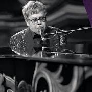 The lyrics THE NEW FEVER WALTZ of ELTON JOHN is also present in the album The diving board (2013)
