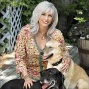 The lyrics WALK THROUGH THIS WORLD WITH ME of EMMYLOU HARRIS is also present in the album I've always needed you (2009)
