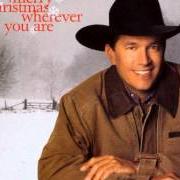 The lyrics SANTA'S ON HIS WAY of GEORGE STRAIT is also present in the album Merry christmas wherever you are (1999)