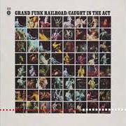 The lyrics CLOSER TO HOME of GRAND FUNK RAILROAD is also present in the album Caught in the act (1975)