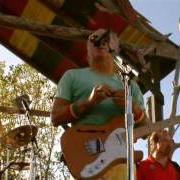 The lyrics WEATHER WITH YOU of JIMMY BUFFETT is also present in the album Live in anguilla (2007)