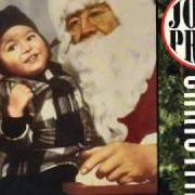The lyrics I SAW MOMMY KISSING SANTA CLAUS of JOHN PRINE is also present in the album A john prine christmas (1993)