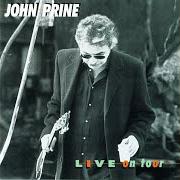 The lyrics THE LATE JOHN GARFIELD BLUES of JOHN PRINE is also present in the album Live on tour (1997)
