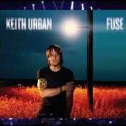 The lyrics SOMEWHERE IN MY CAR of KEITH URBAN is also present in the album Fuse (2013)