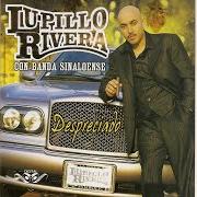 The lyrics LA INTERESADA of LUPILLO RIVERA is also present in the album Entre copas y botellas (2006)