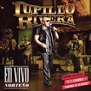 The lyrics QUE TAL SI TE COMPRO of LUPILLO RIVERA is also present in the album En vivo norteno (2013)
