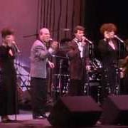 The lyrics A KISS TO BUILD A DREAM ON of MANHATTAN TRANSFER is also present in the album Spirit of st. louis (2000)