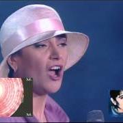 The lyrics SCENNE L'ARGIENTO of MIA MARTINI is also present in the album Lacrime (1992)