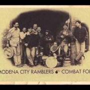 The lyrics AHMED L'AMBULANTE of MODENA CITY RAMBLERS is also present in the album Combat folk (1993)