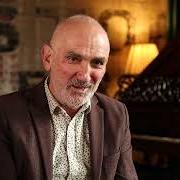 The lyrics BACK TO THE FUTURE of PAUL KELLY is also present in the album Fever longing still (2024)