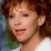 The lyrics I'D RATHER RIDE AROUND WITH YOU of REBA MCENTIRE is also present in the album What if it's you (1996)