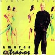 The lyrics ASOMBRO of RUBBY PEREZ is also present in the album Amores extraños (1995)