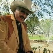 The lyrics CRUZ DE OLVIDO of VICENTE FERNANDEZ is also present in the album Canciones de sus películas (2008)