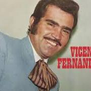 The lyrics Y NUESTRO CARIÑO QUE of VICENTE FERNANDEZ is also present in the album La voz que usted esperaba (1967)
