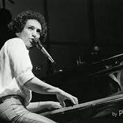 The lyrics SUIS TA MUSIQUE OÙ ELLE VA of MICHEL BERGER is also present in the album Mon piano danse (1976)