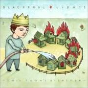 The lyrics THE TRUTH ABOUT LOVE of BLACKPOOL LIGHTS is also present in the album This town's disaster (2006)