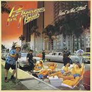 The lyrics HEAT IN THE STREET of PAT TRAVERS is also present in the album Heat in the street (1978)