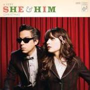 The lyrics ROCKIN' AROUND THE CHRISTMAS TREE of SHE & HIM is also present in the album A very she and him christmas (2011)