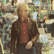 The lyrics A WOMAN IN LOVE (IT'S NOT ME) of TOM PETTY AND THE HEARTBREAKERS is also present in the album Hard promises (1981)