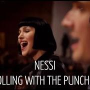 The lyrics BRUSH YOU OFF of NESSI is also present in the album Rolling with the punches (2015)