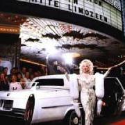 The lyrics WHY'D YOU COME IN HERE LOOKIN' LIKE THAT of DOLLY PARTON is also present in the album White limozeen (1989)