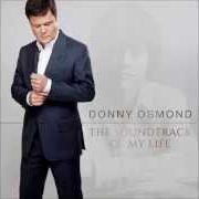 The lyrics MOON RIVER of DONNY OSMOND is also present in the album The soundtrack of my life (2014)