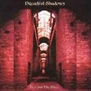 The lyrics TIES OF TIME (STRING EDIT) of DREADFUL SHADOWS is also present in the album Burning the shrouds (1997)