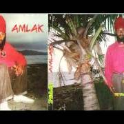The lyrics REY EN ZION- JAH PABLO of FIDEL NADAL is also present in the album Amlak (2003)