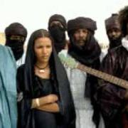 The lyrics MATADJEM YINMIXAN of TINARIWEN is also present in the album Aman iman (2007)