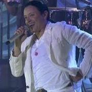 The lyrics NUESTRA CANCION of ELVIS CRESPO is also present in the album Live from las vegas (2009)