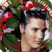 The lyrics HERE COMES SANTA CLAUS (RIGHT DOWN SANTA CLAUS LANE) of ELVIS PRESLEY is also present in the album Elvis' christmas album (1957)