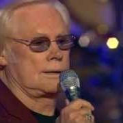The lyrics WE DIDN'T SEE A THING - W/ RAY CHARLES AND CHET ATKINS of GEORGE JONES is also present in the album 40 years of duets (2007)